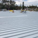 Flat Metal Roof Leaking: Causes and Effective Solutions